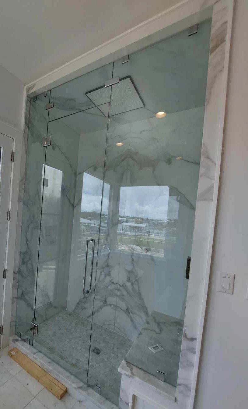 Frameless shower door 114
