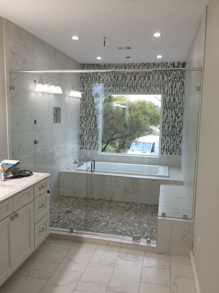 Frameless shower door 52