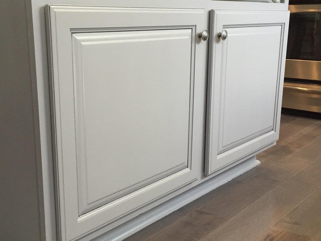 close up of distressed white dove painted cabinets