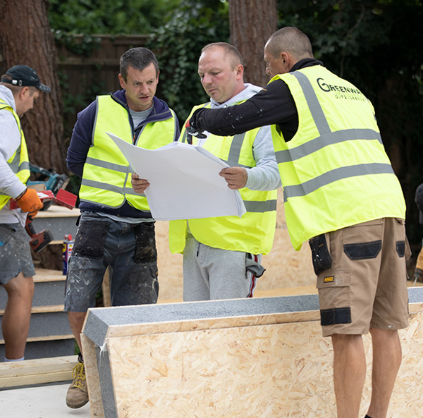 The Greenway team collaborating on the design of a large SIPs panel garden cabin, showcasing expertise and teamwork.