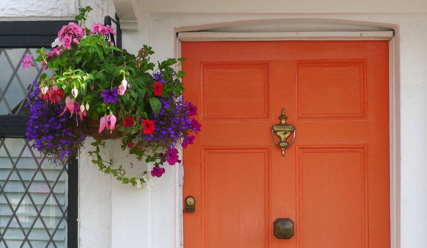 There's nothing quite as charming as the sight of vibrant flowers adorning a front door, adding a touch of natural beauty and warmth to your home's entrance.