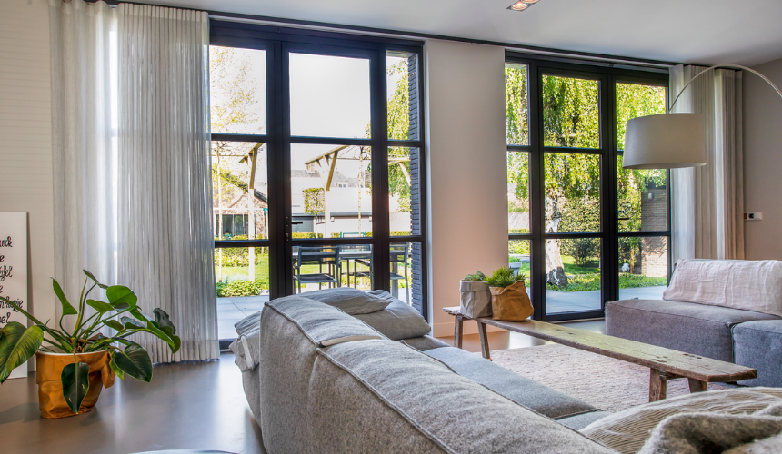 Large picture windows let natural light flood into living spaces, instantly elevating your home’s aesthetic and making rooms feel bigger. 