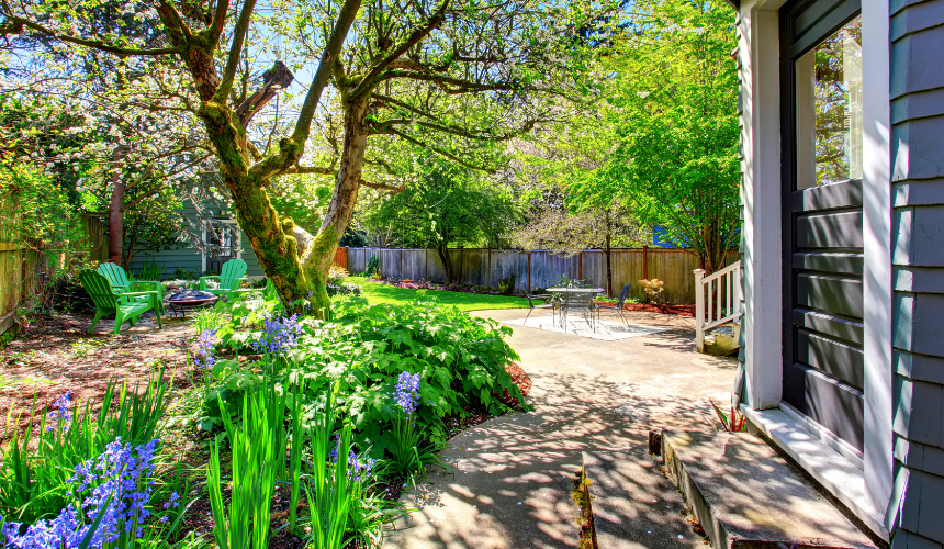 A beautiful multi-zone garden featuring a cosy chill-out area, inviting dining space, practical potting shed and lush lawn. Each zone is thoughtfully designed to maximise functionality and enjoyment.