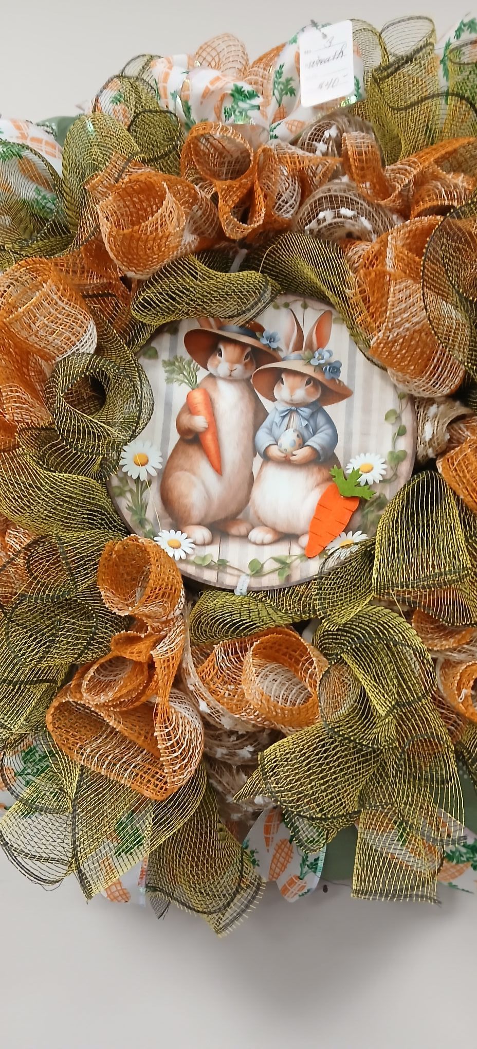 Autumn wreath with orange leaves, berries, and a central fox illustration on a white background