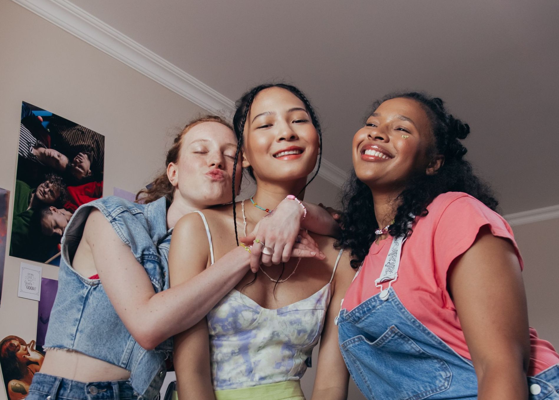 3 girls hugging and smiling