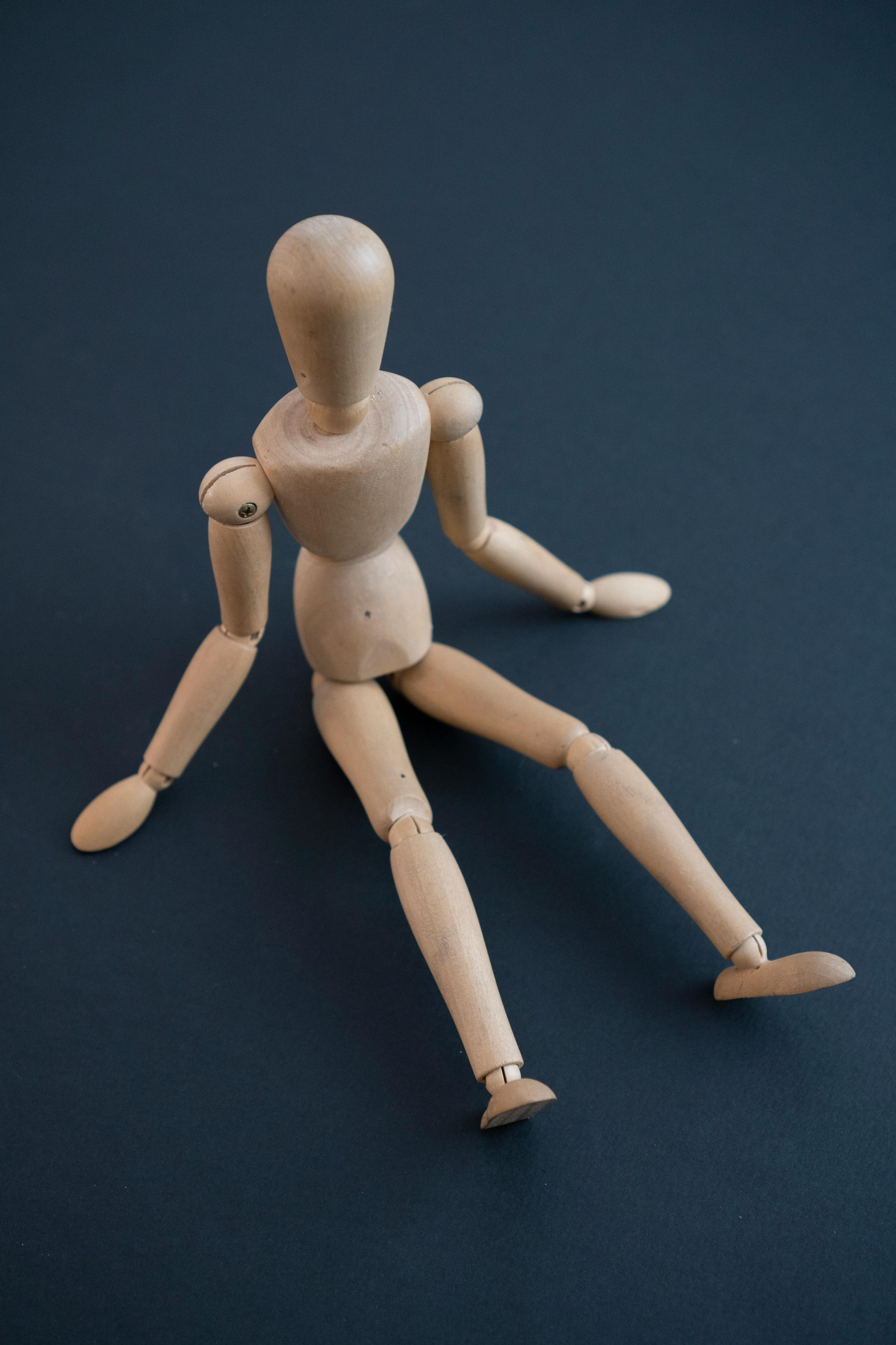 a small wooden mannequin