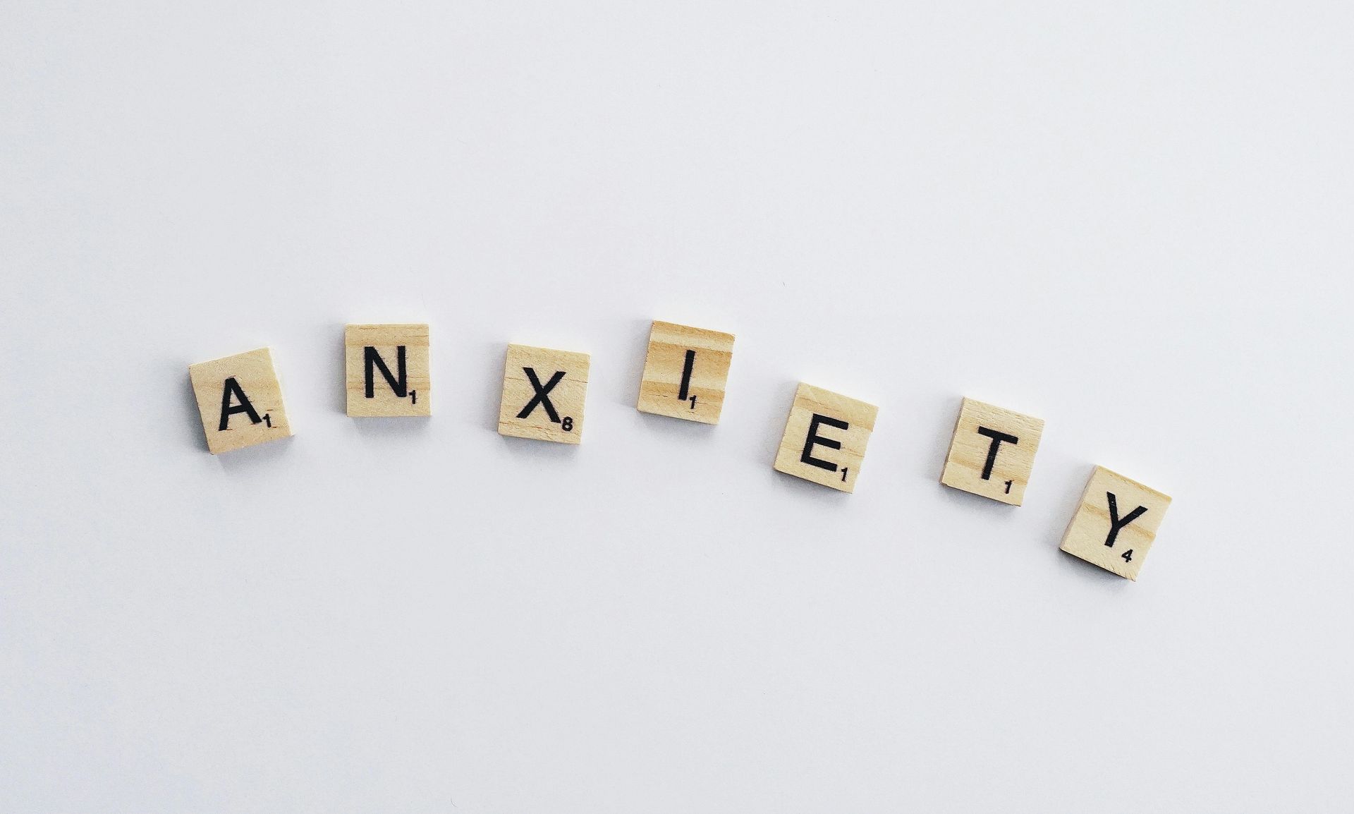 anxiety spelled out in tiles