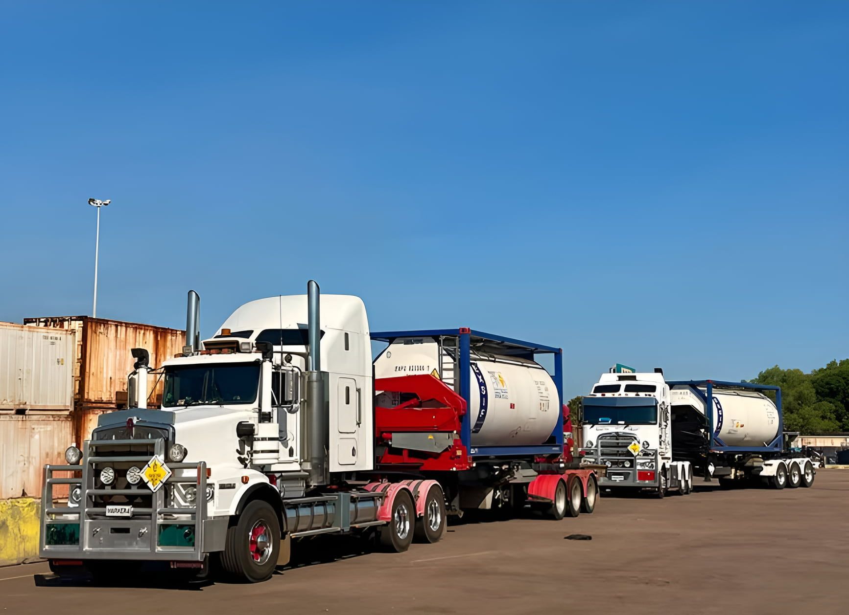 A Row of Semi Trucks Are Parked in a Parking Lot — Harker Haulage In East Arm, NT