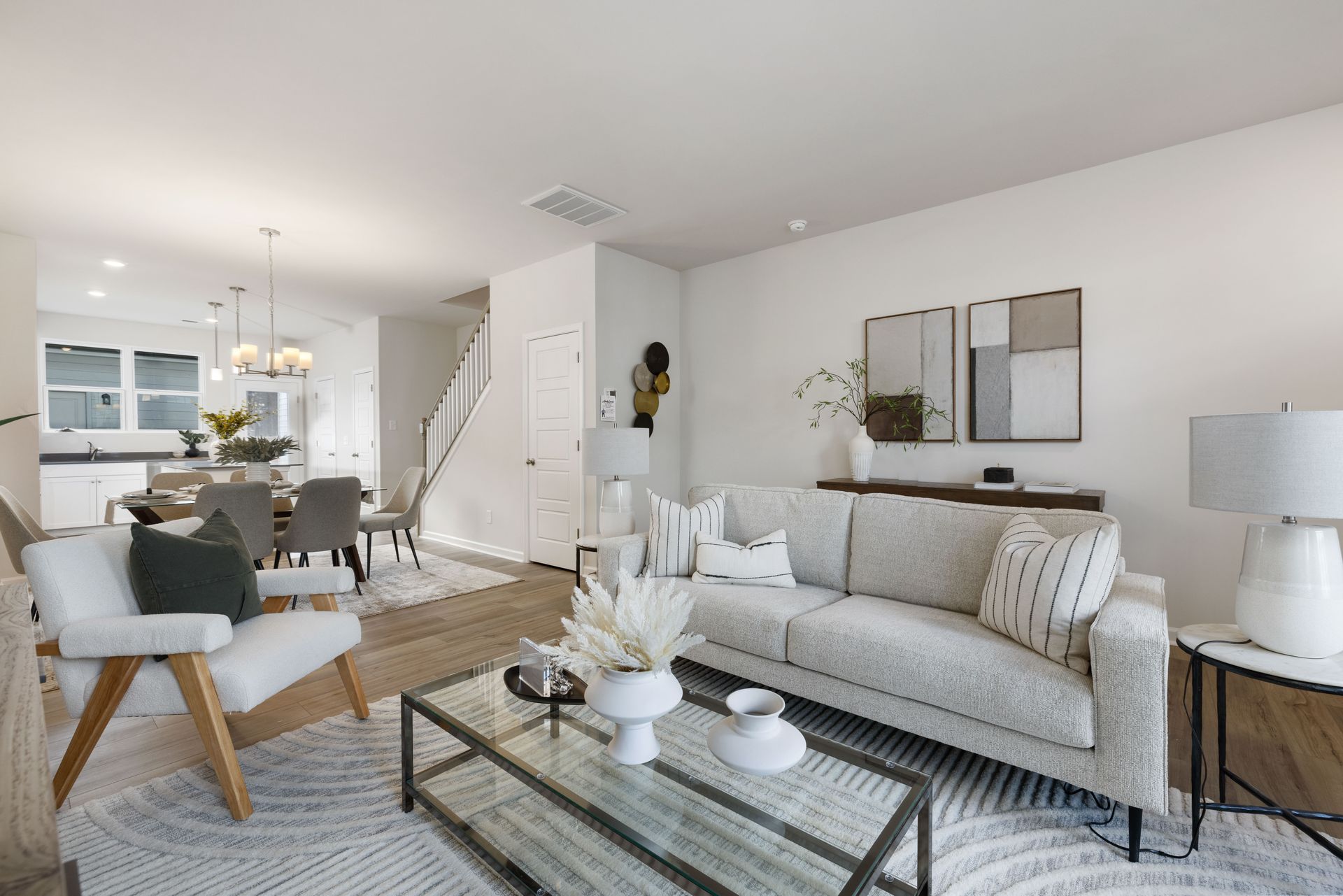 Fully decorated living room in a Brookline home, showcasing personal touches and cozy design elements.