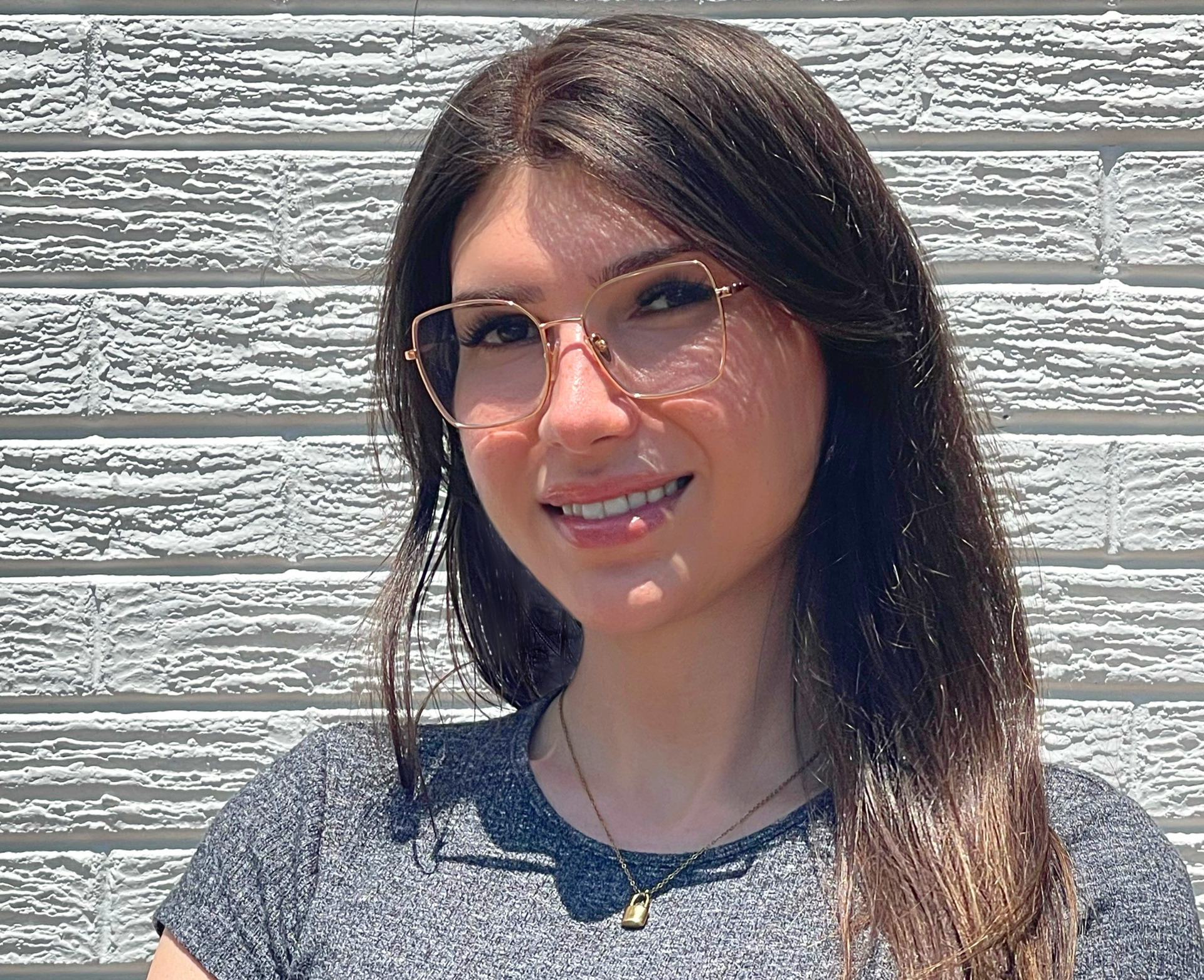 Headshot of Fabricia De Almeida, Bookkeeper at Brookline Homes, managing financial records.