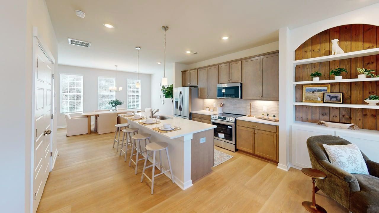 Photo of the living areas of a Three Story Townhome in Vanguard at Vermillion in Huntersville, NC