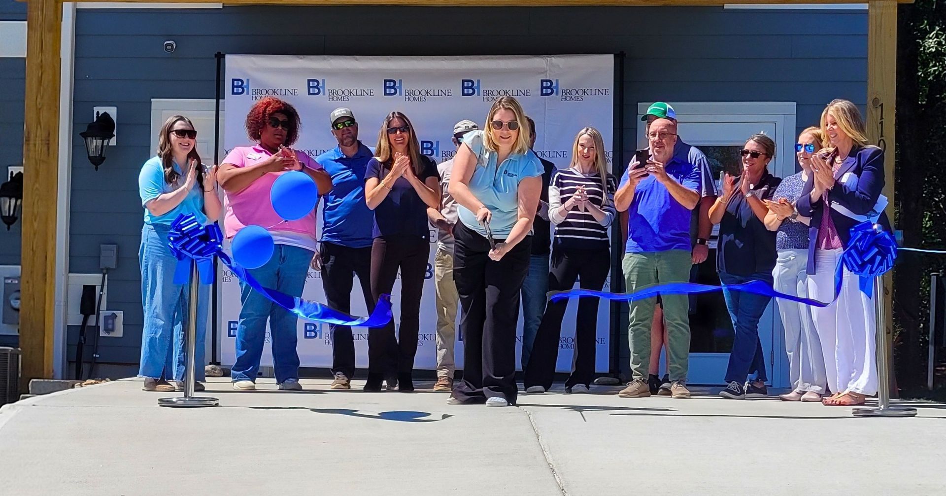 Photo of ribbon cutting a Vanguard a Vermillion n Huntersville, NC
