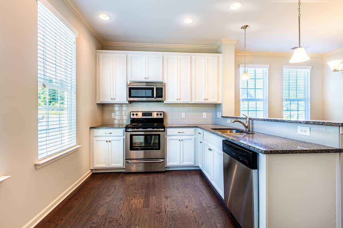 Master bedroom in Water’s Edge Parkview Series offering spacious comfort and natural light.