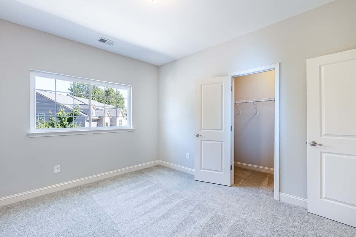 Second bedroom in Water’s Edge Parkview Series ideal for family or guests.