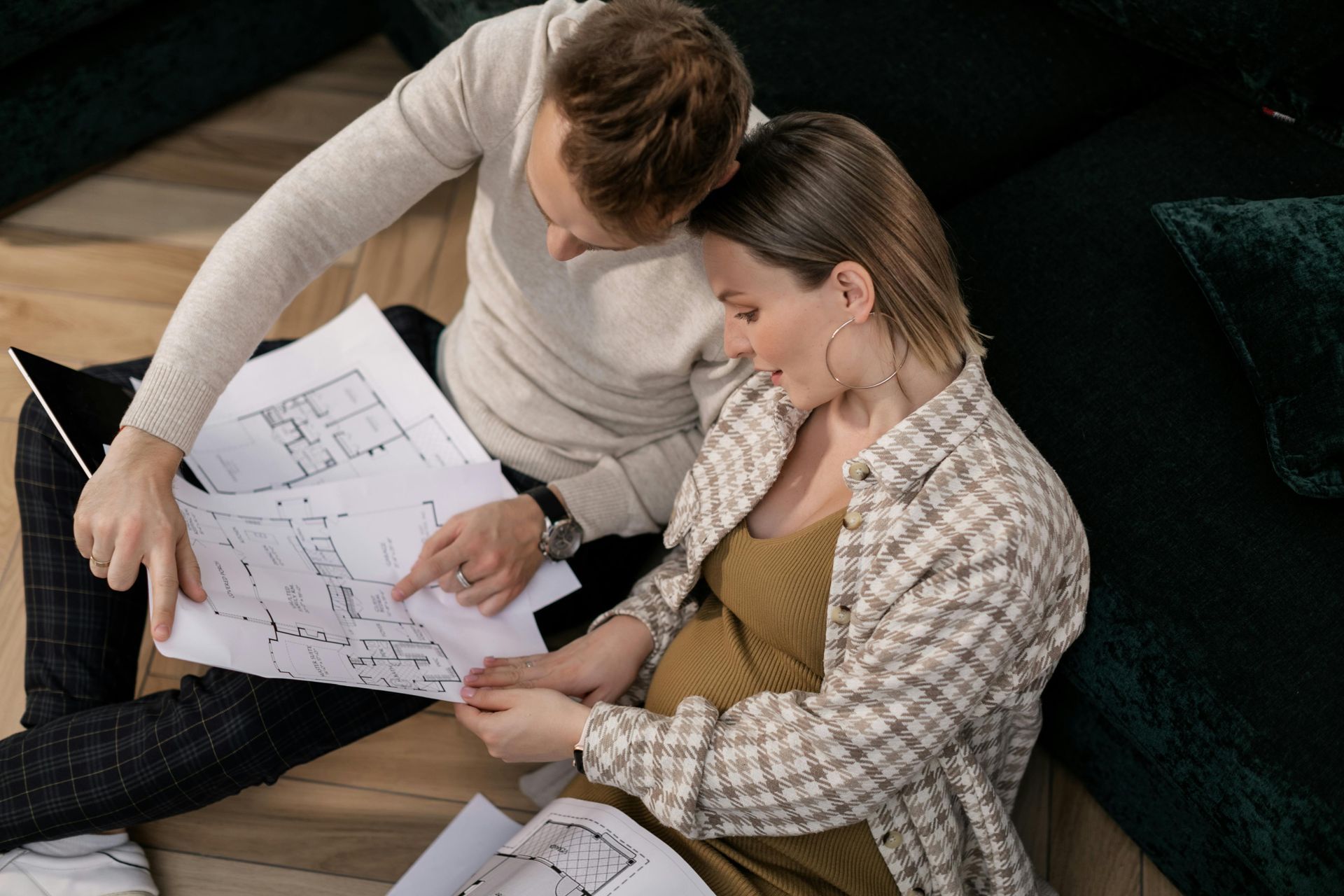 Couple deciding which floor plan options will best fit their needs.