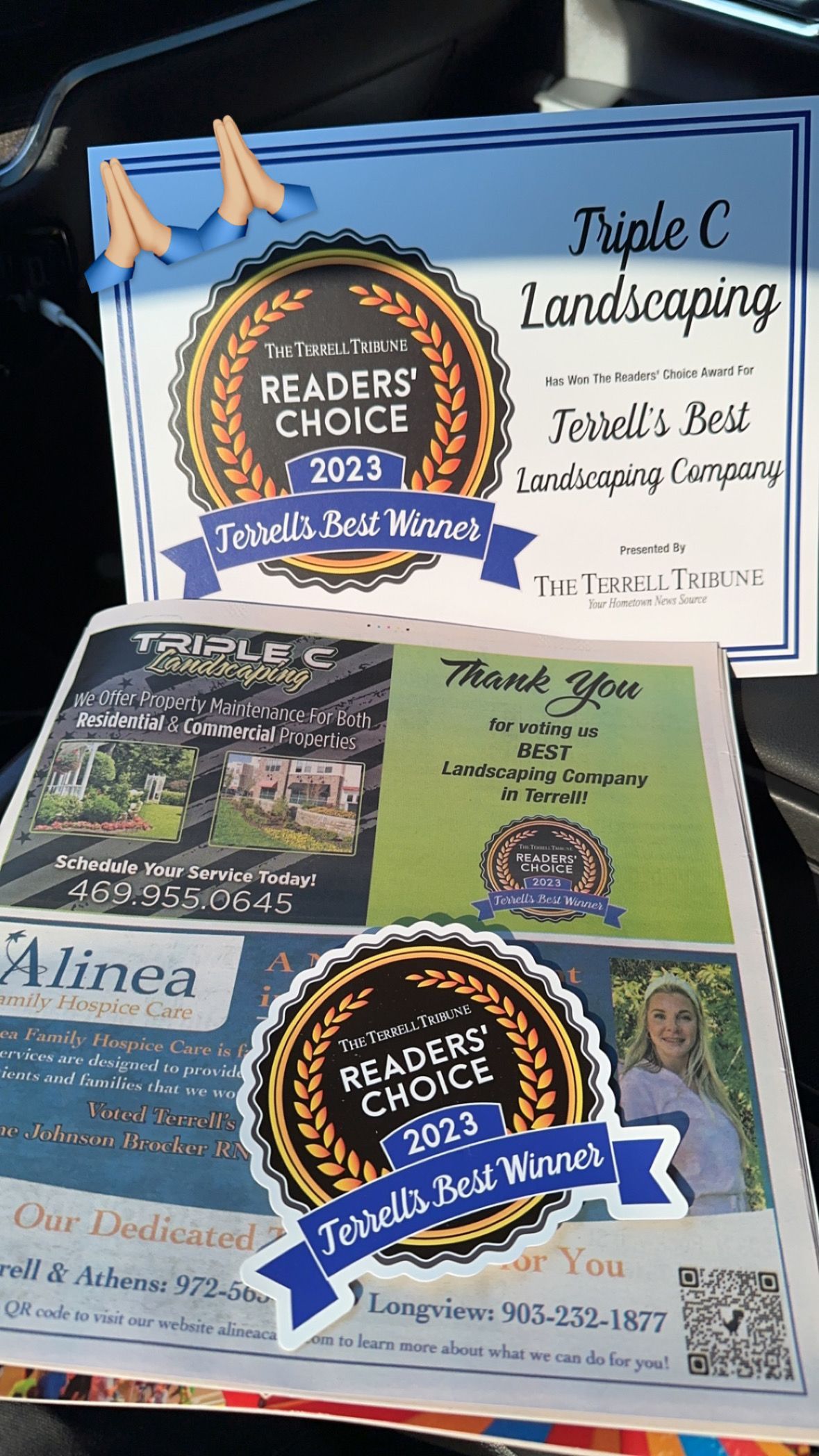 A couple of cards sitting on top of each other on a table.