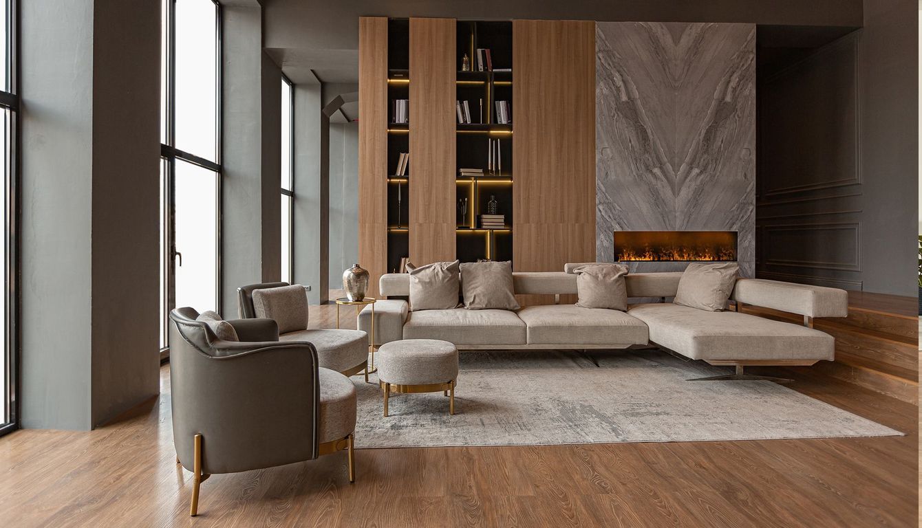 Modern living room with a large sectional sofa, fireplace, and wood accents.