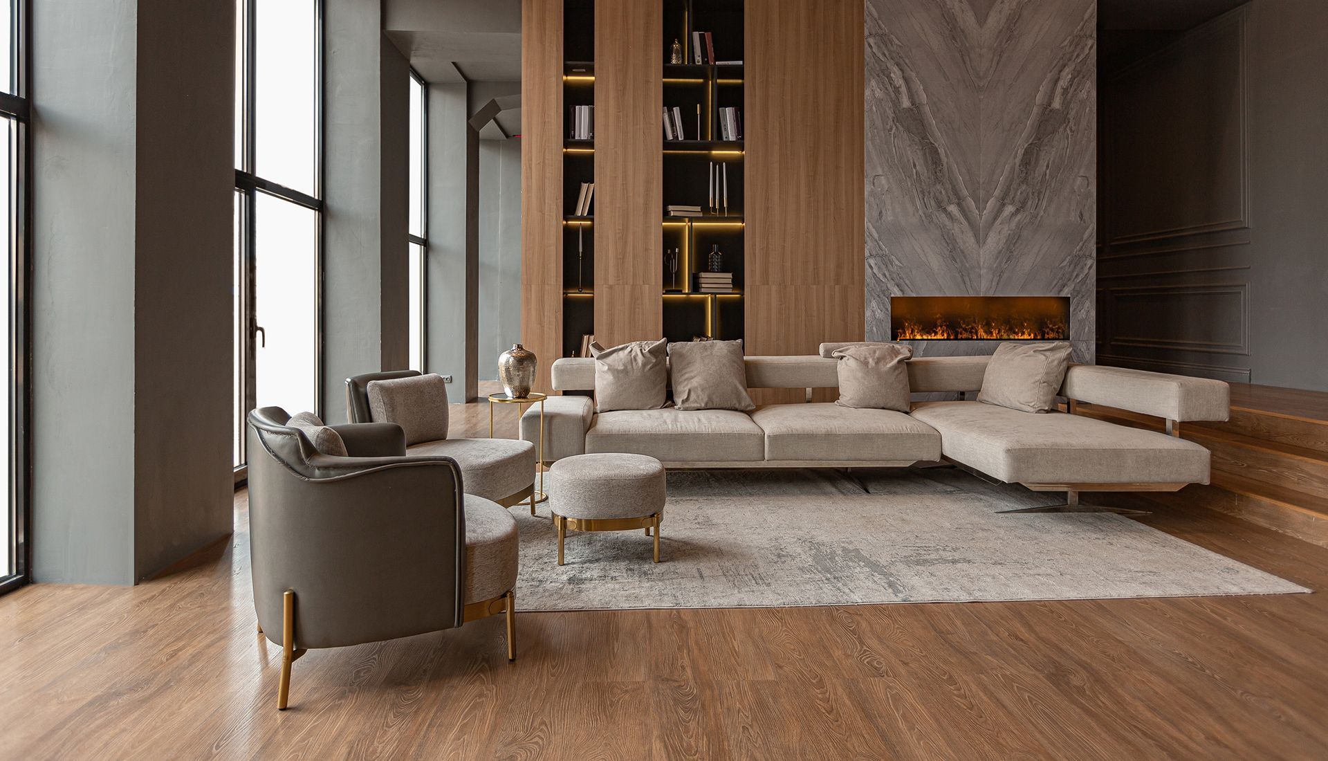 Modern living room with beige sectional sofa, fireplace, and wooden accents.