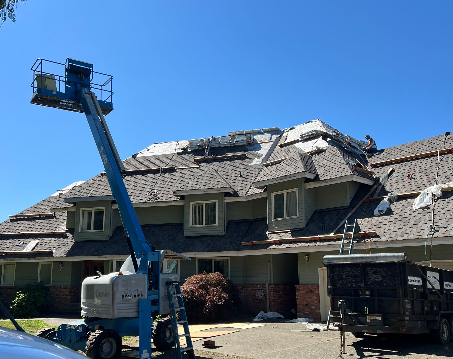 Residential home receiving a new roof installation by Western Washington Construction in Ocean Shores, WA