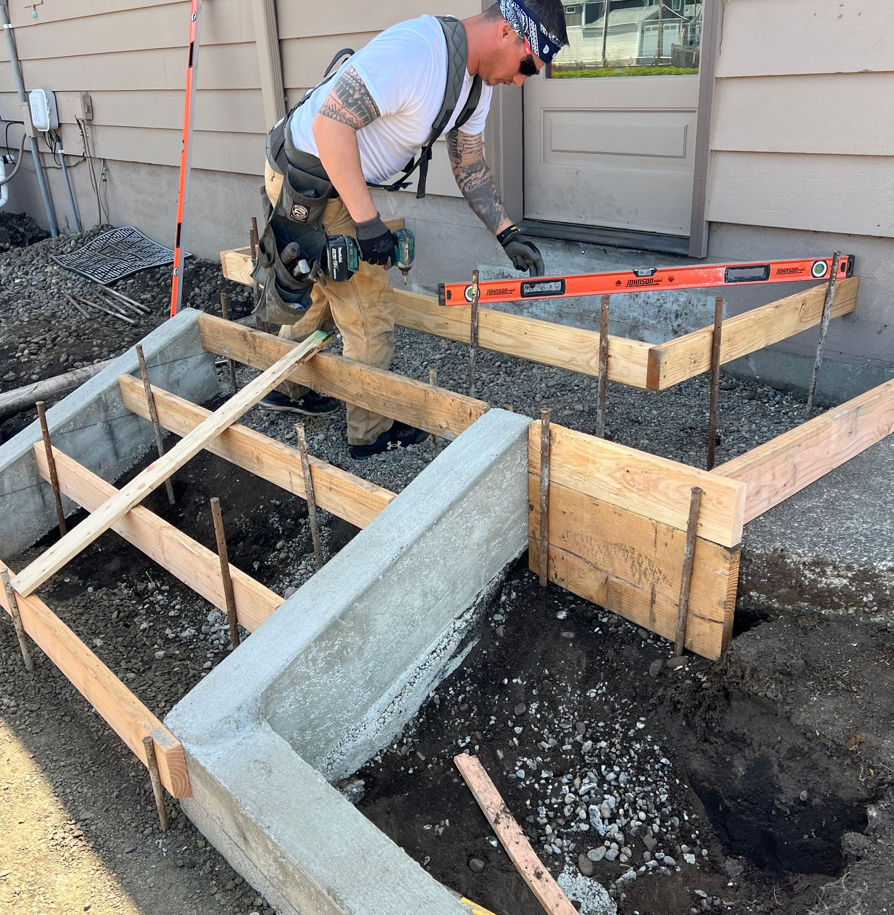 New concrete porch stairs at a residential property built  by Western Washington Construction Ltd serving Aberdeen, WA
