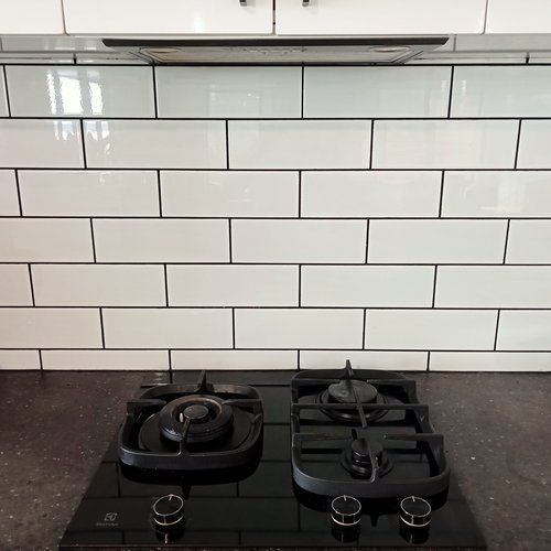 Black Gas Stove & White Splashback — Derwent Park, TAS — Allen Built 