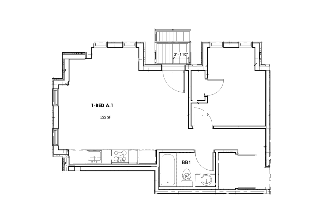 Floor plan of a building with rooms, doorways, and stairwell details, viewed from above.