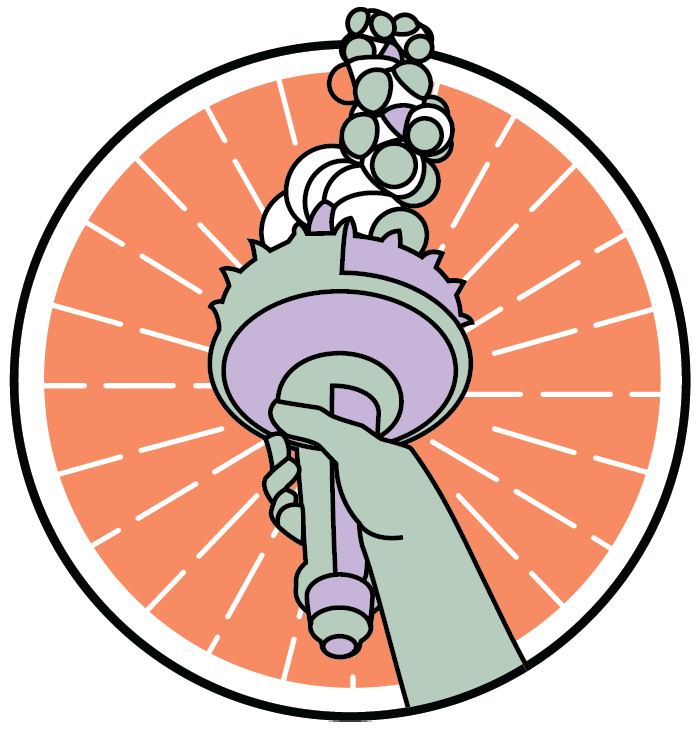 A hand is holding a torch with whipped cream on it.