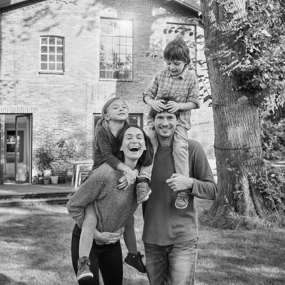 A photo of a happy family - links to insurance protection page