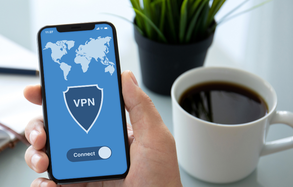 Cup of coffee and a mobile phone with VPN written on it