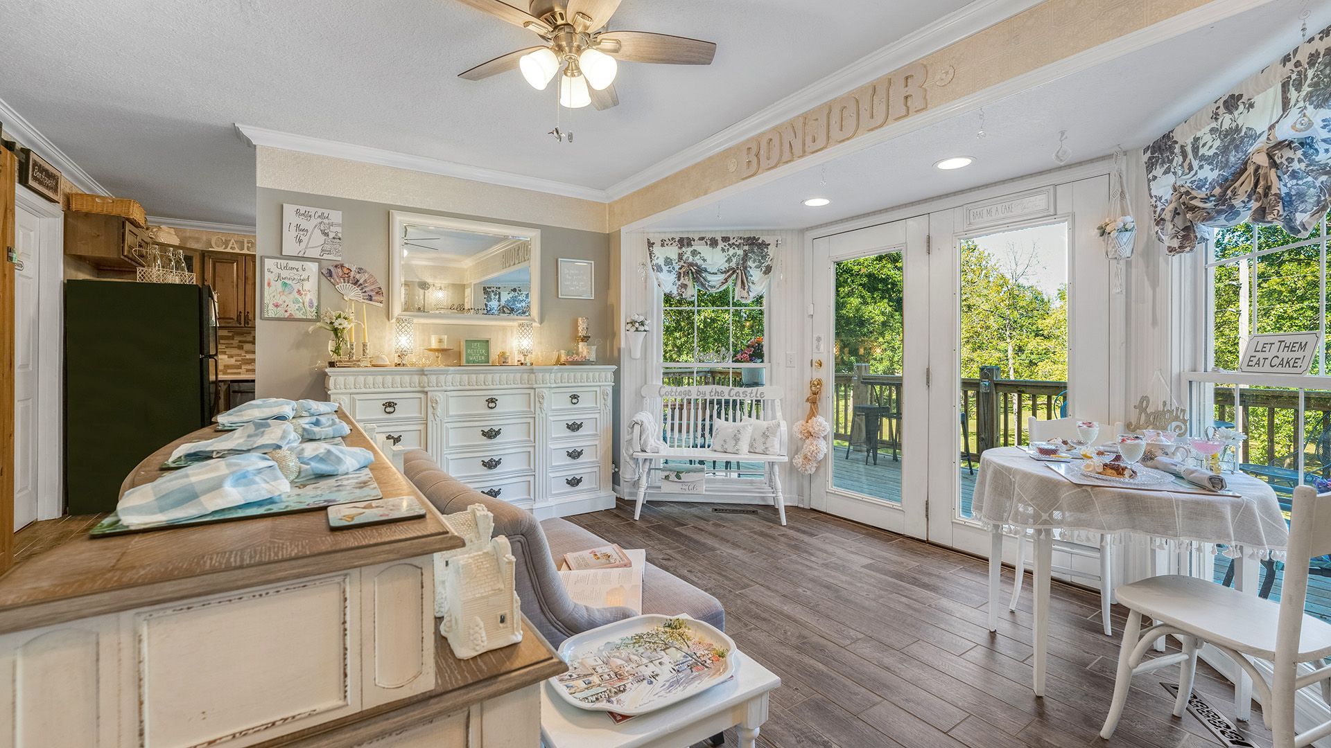 open room leading to french doors on the balcony