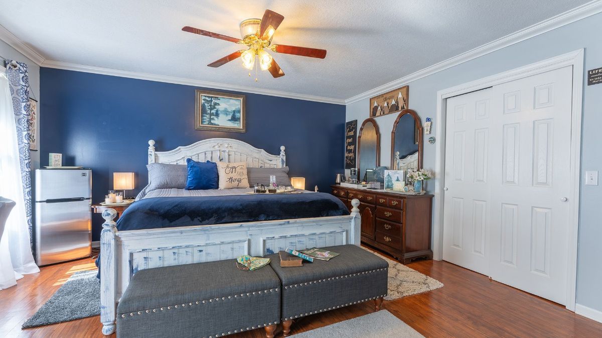 bedroom with a bed and a ceiling fan