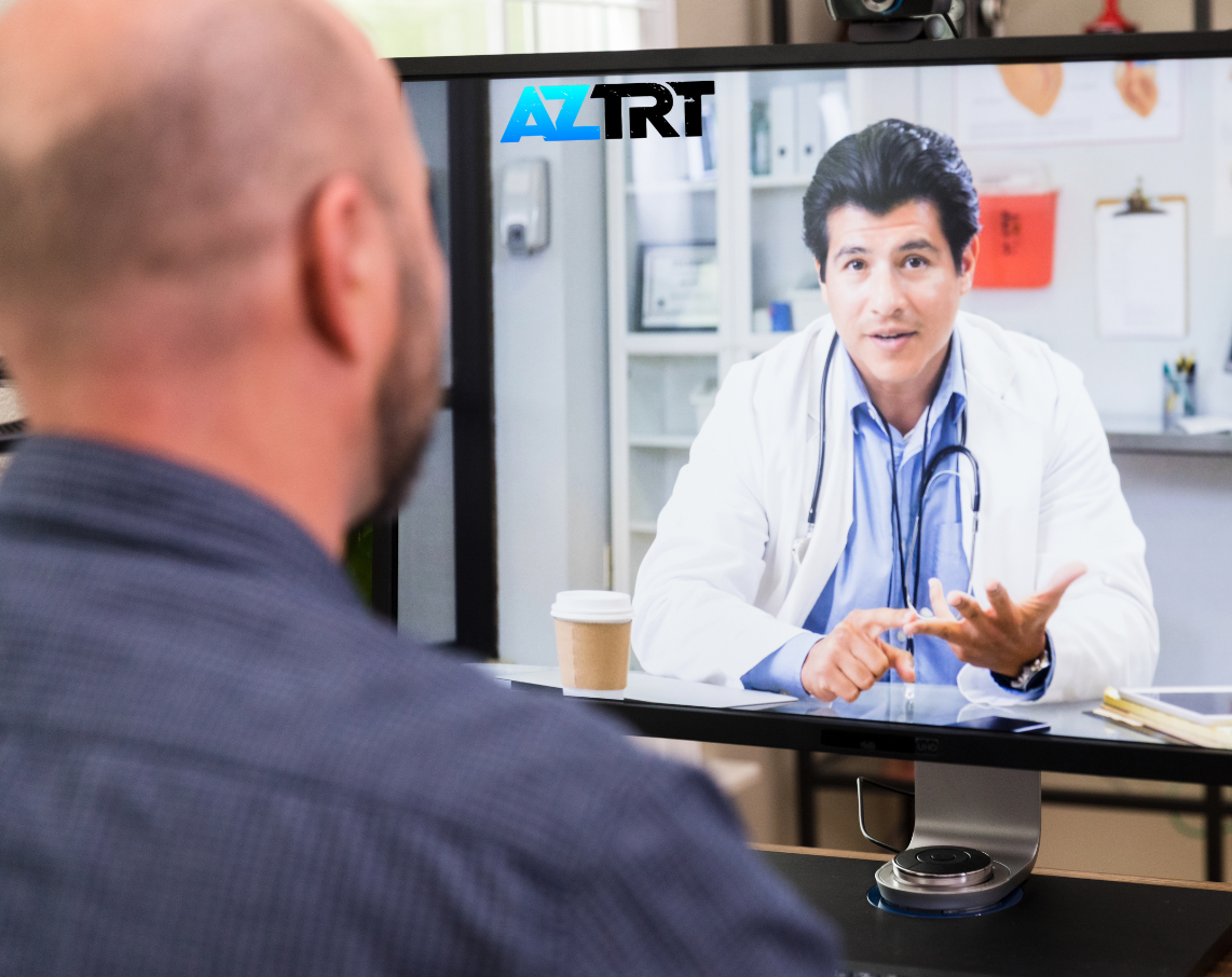 A man is talking to a doctor on a computer screen.