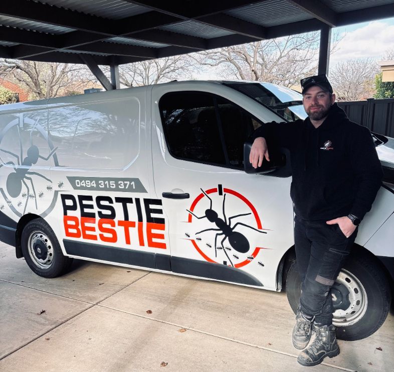 Man Leans on Pestie Bestie Van — Pestie Bestie Pest Control In Shepparton, VIC