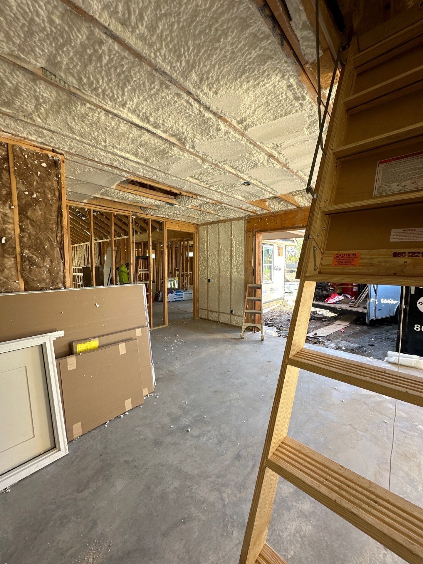 There is a ladder in the middle of the room.