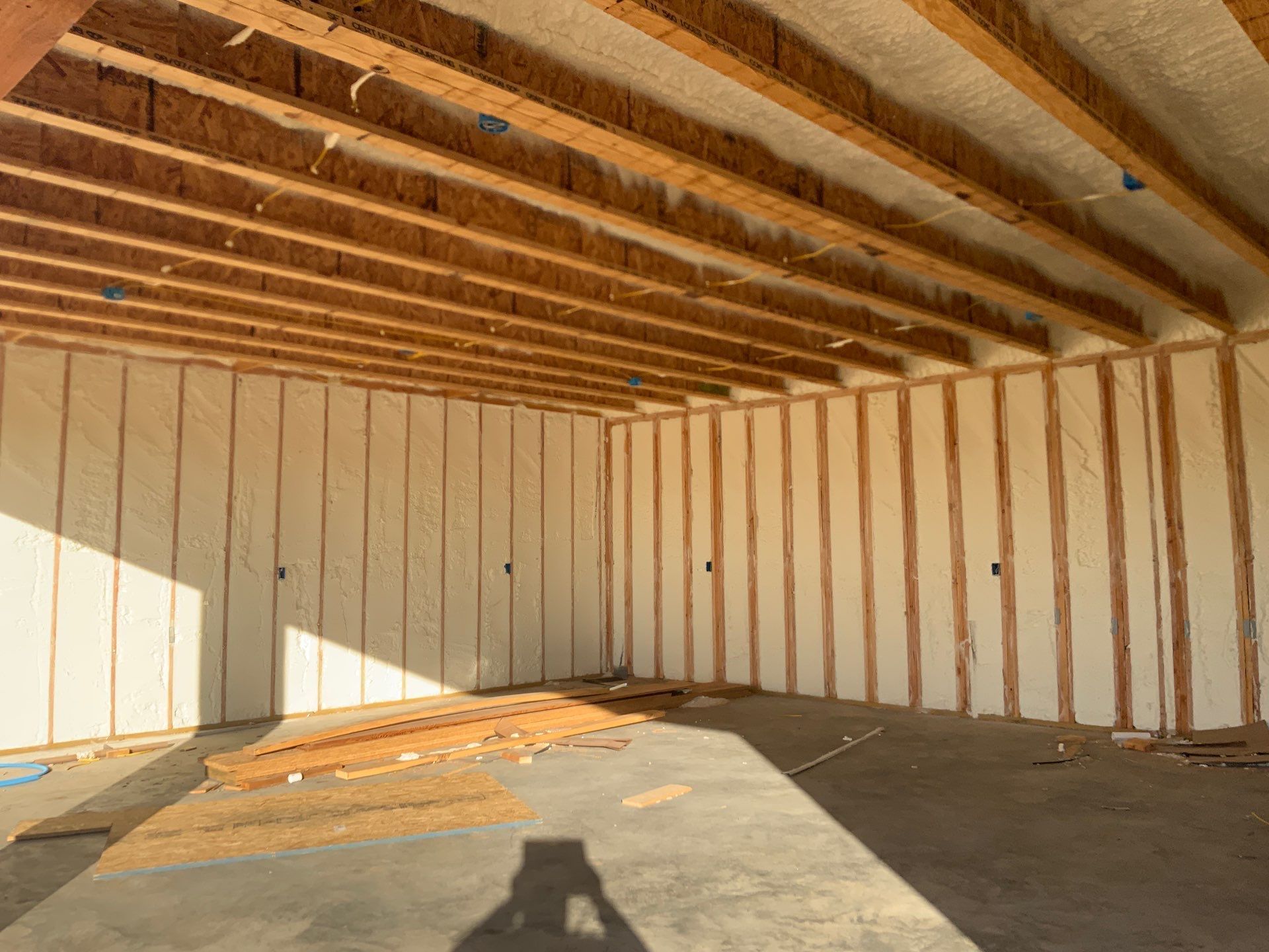 A large room with a lot of insulation on the walls and ceiling.