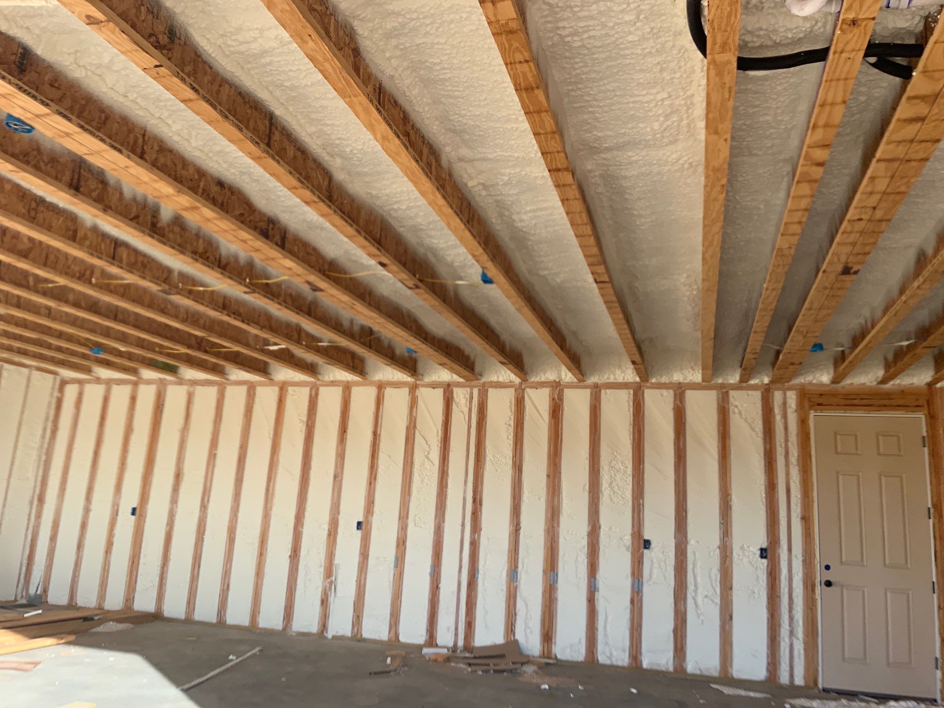 A room with a lot of insulation on the walls and ceiling.