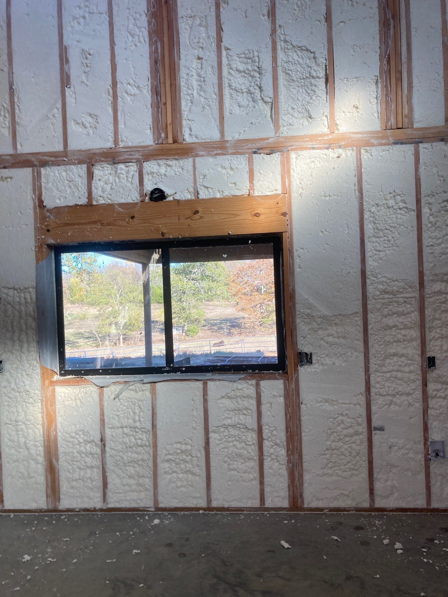 A room with a window and a lot of insulation