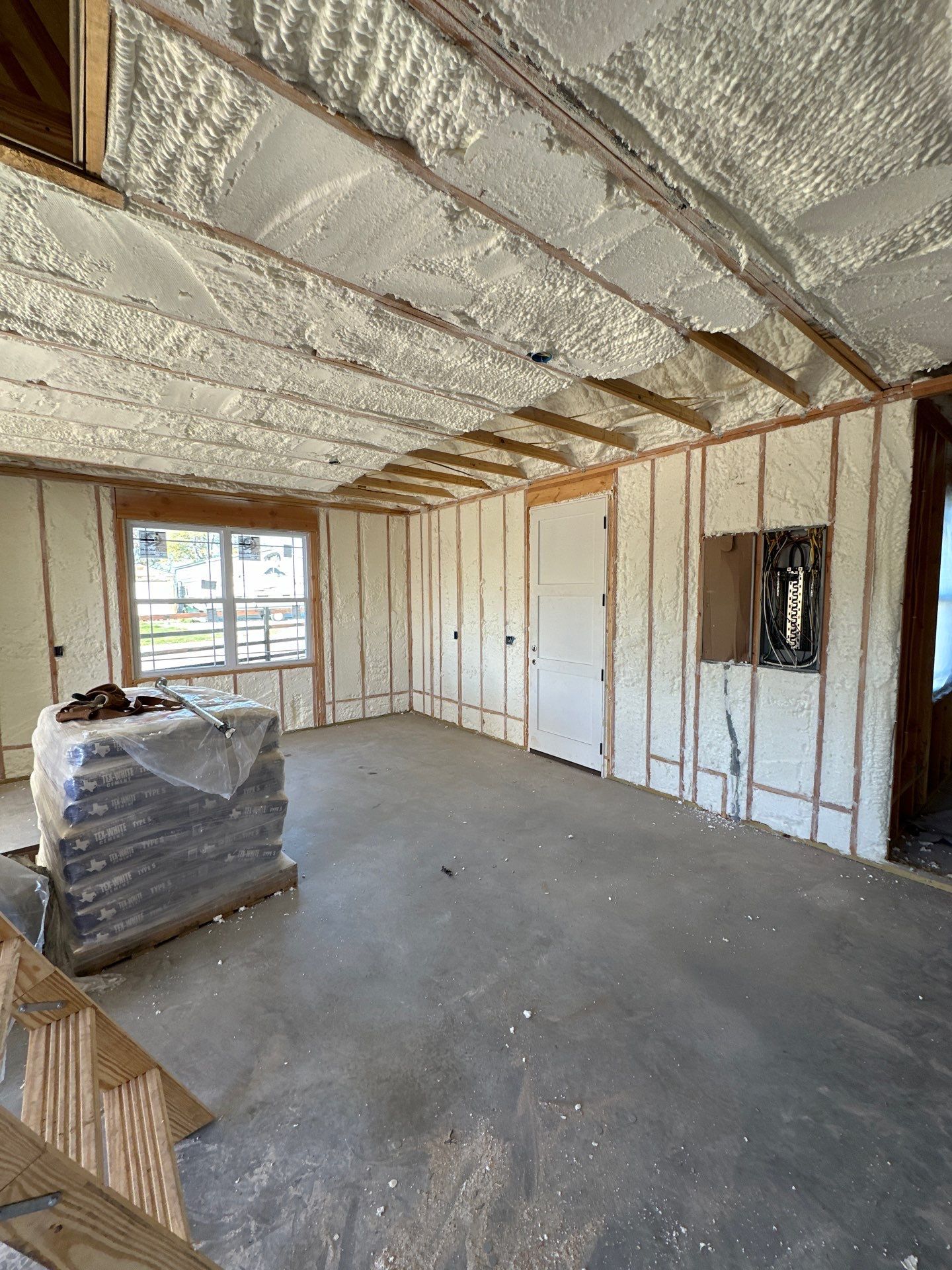 A room with a lot of insulation on the walls and ceiling.