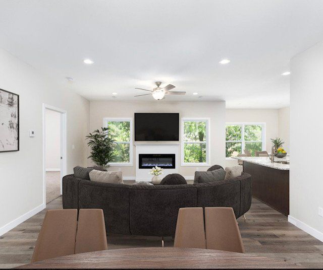 A living room with a couch and a television