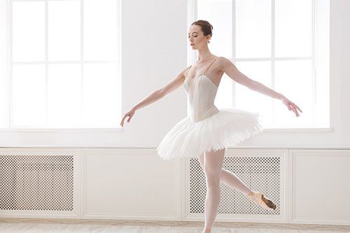 Dancewear — Female Dancer Wearing White