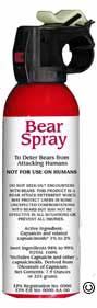 Red bear spray canister with black nozzle, labeled 