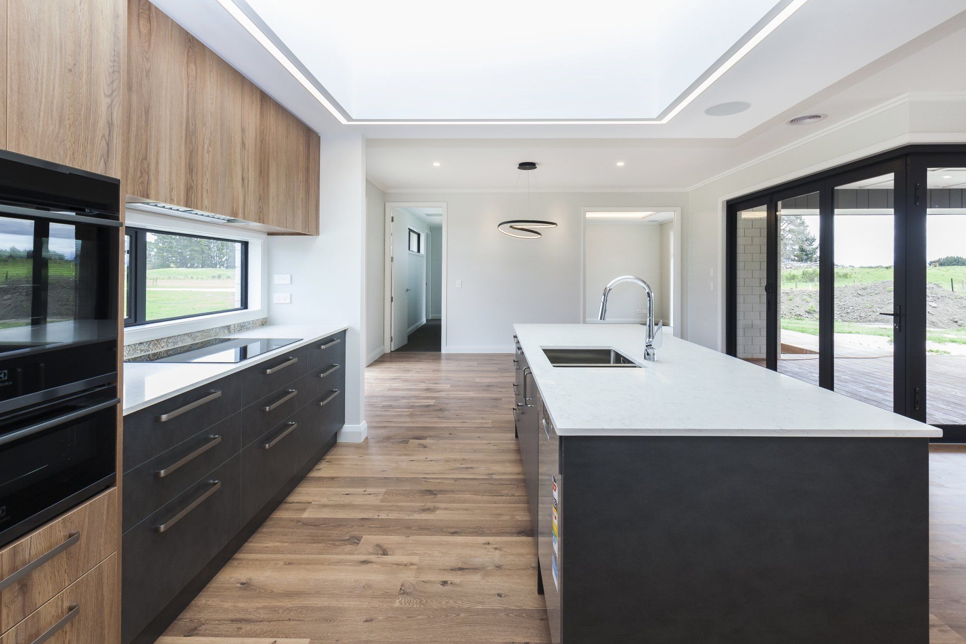 There is a large island in the middle of the kitchen.