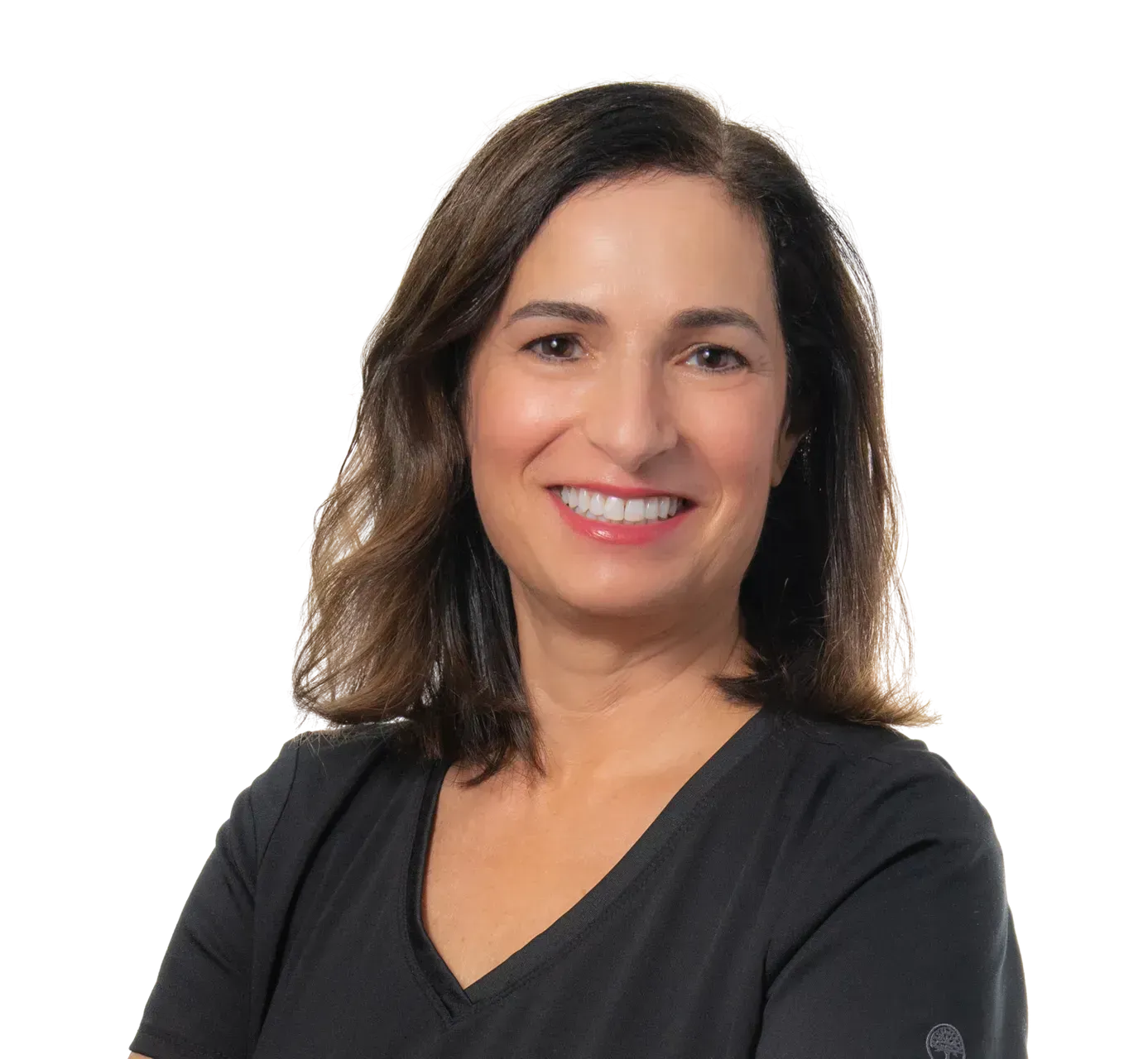 A woman in a black shirt is smiling for the camera.