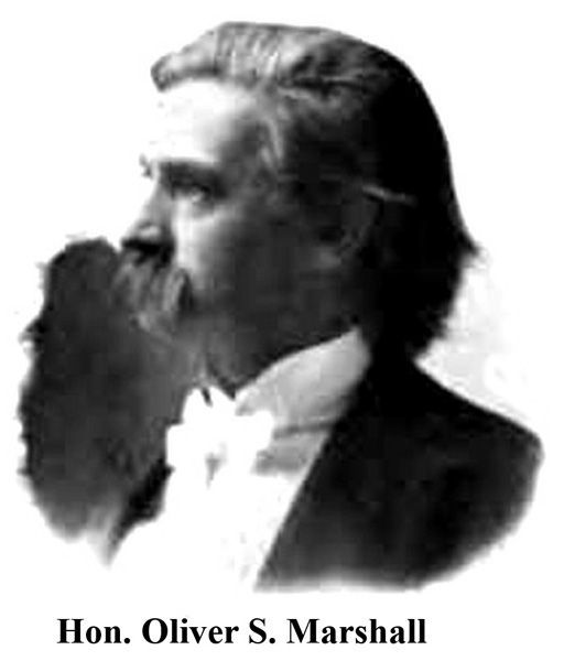 Black-and-white portrait of Hon. Oliver S. Marshall in profile, wearing a suit and bow tie.