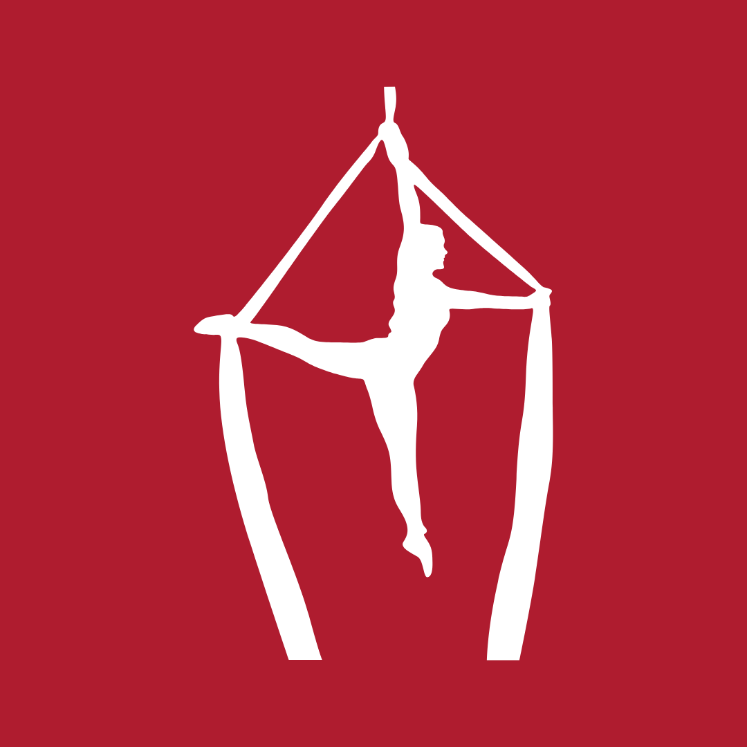silhouette of a girl doing aerial silks  on a red background.