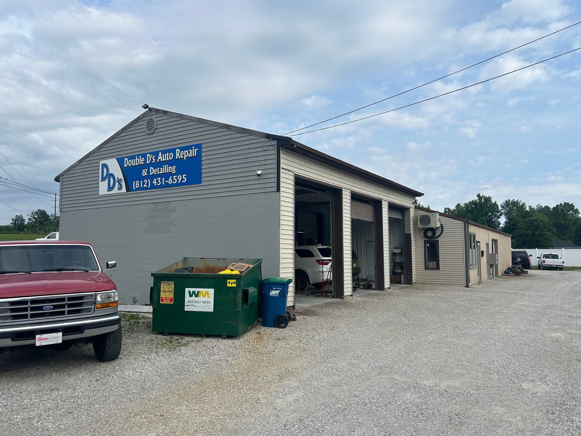 A building with a sign that says buy a barn
