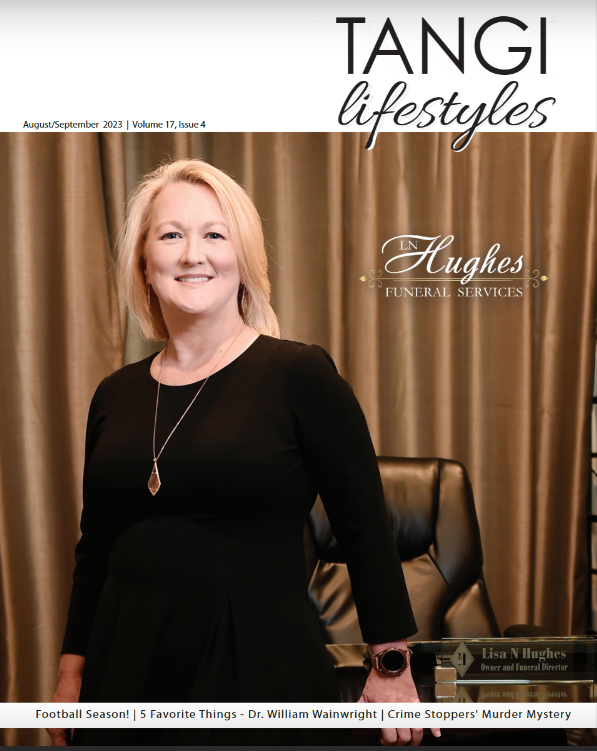 Cover of Tangi Lifestyles magazine featuring Lisa in a black dress, promoting Hughes Funeral Services.