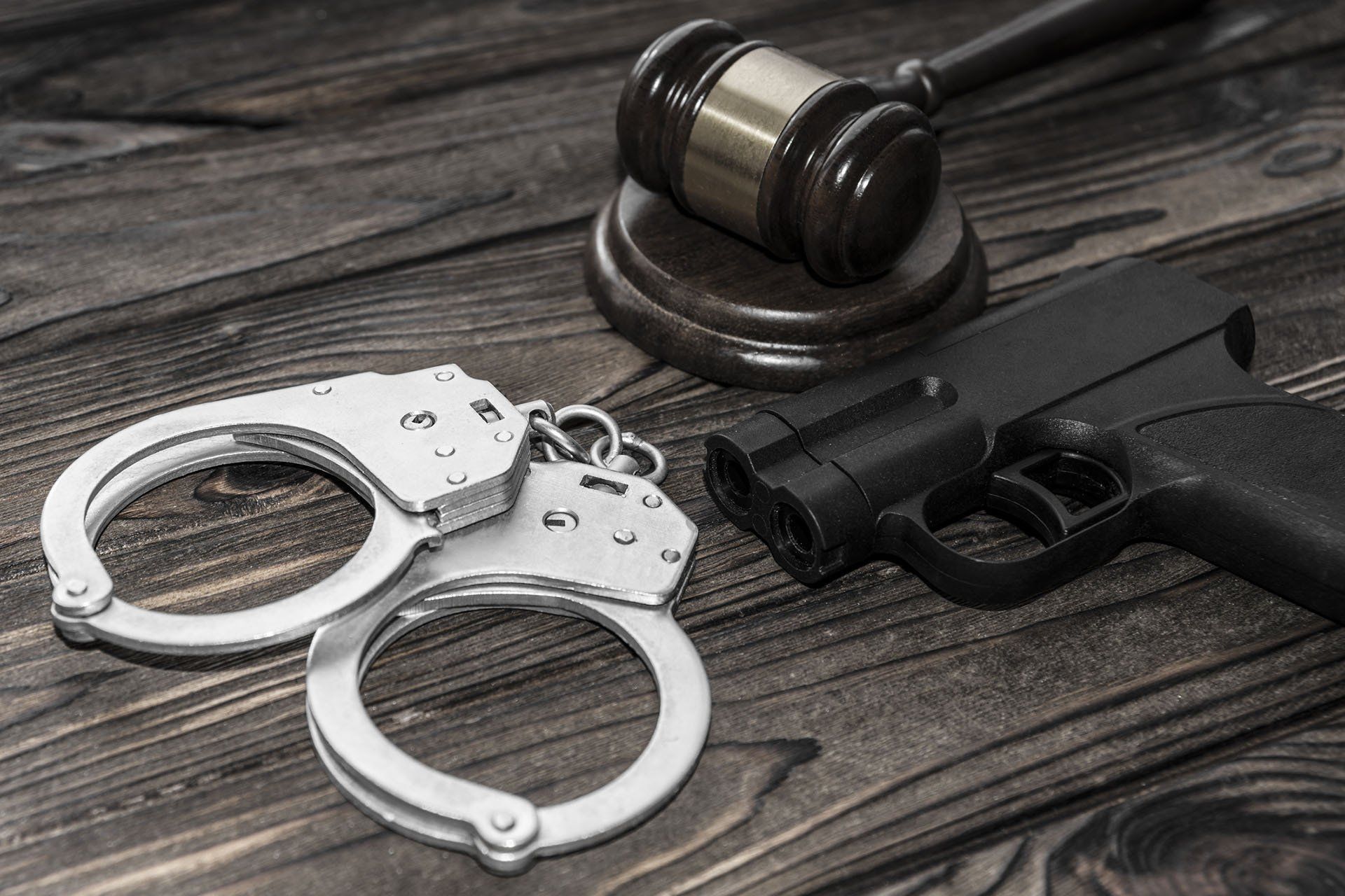 Handcuffs, Gun and a Gavel — Natchitoches, LA — Kelly & Townsend LLC Attorney's