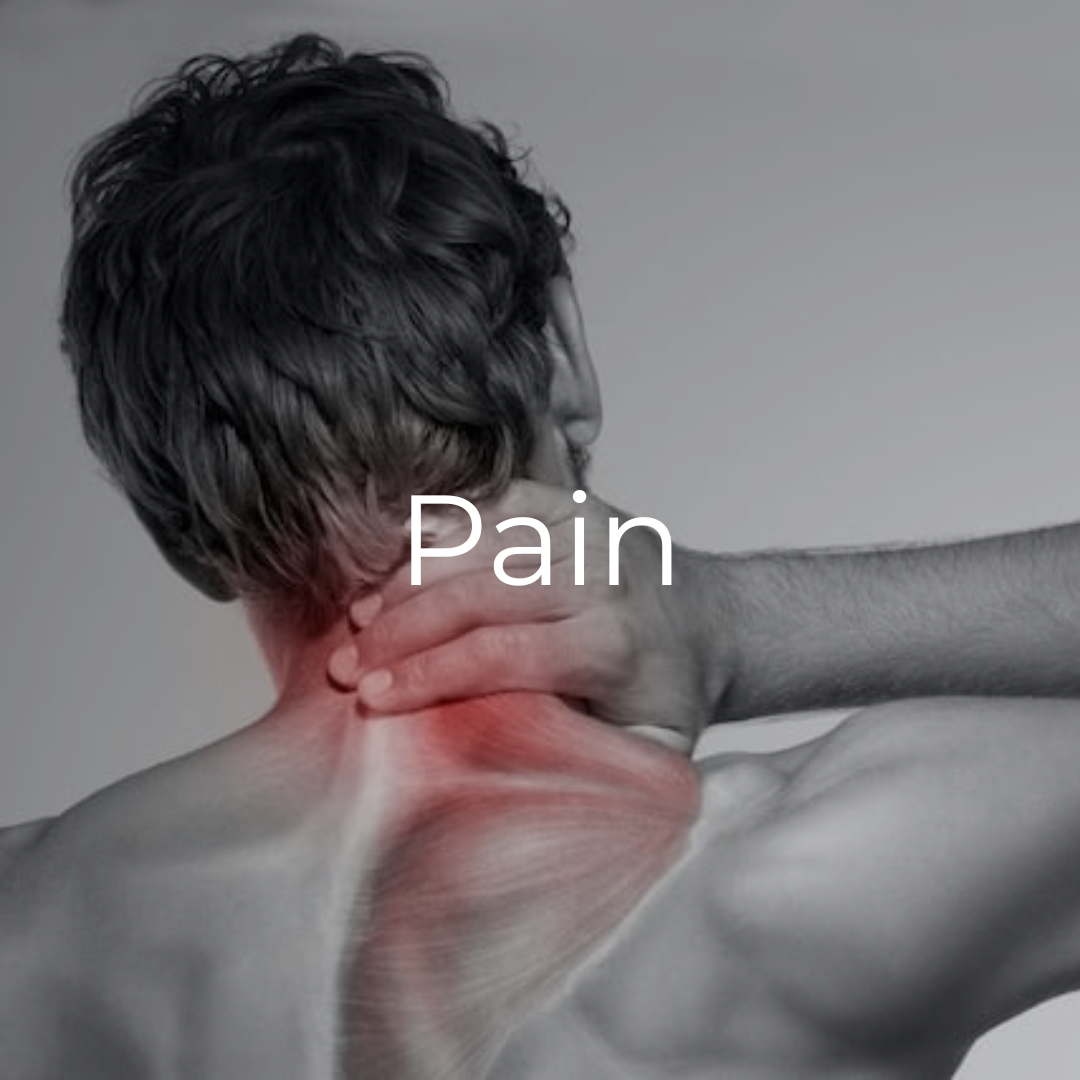 A man is holding his neck in pain