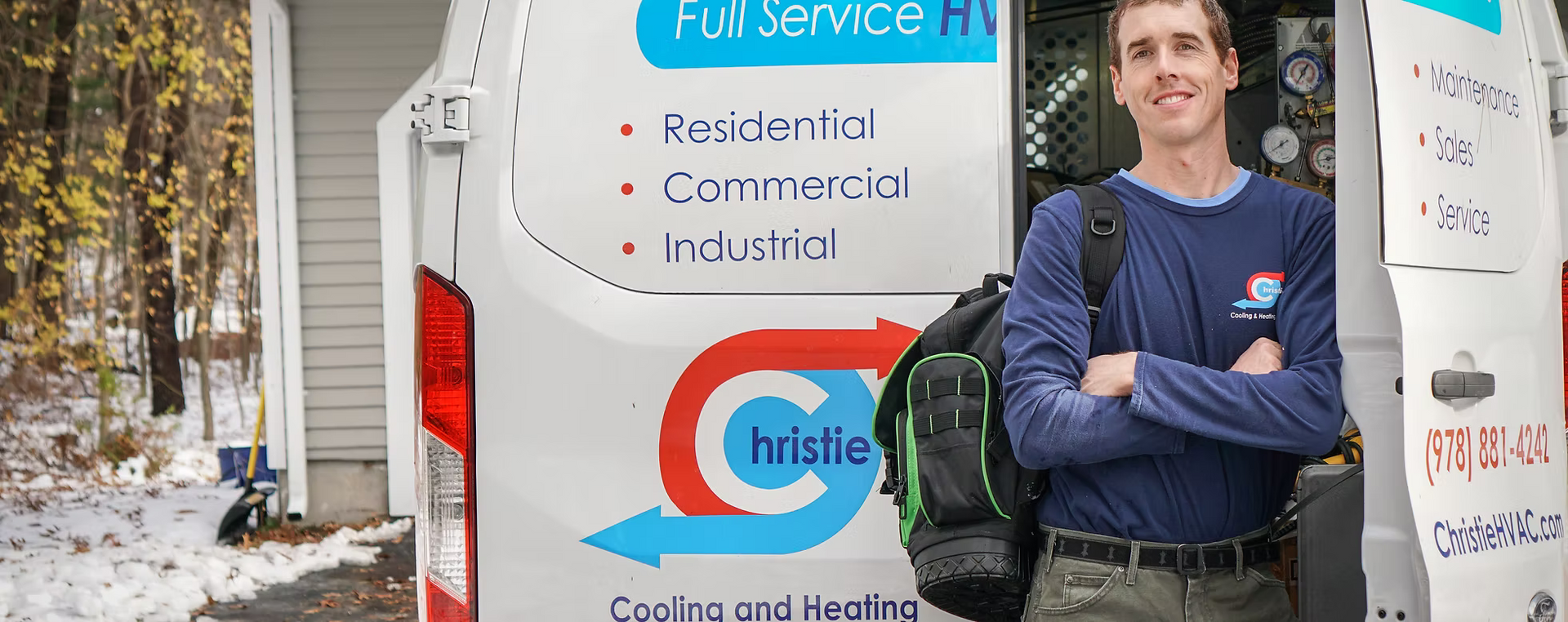 Man standing next to a van with 